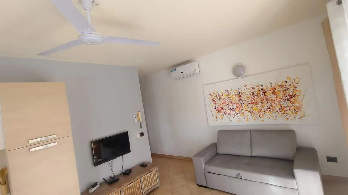 Meridiana Cozy Apartment — Living room