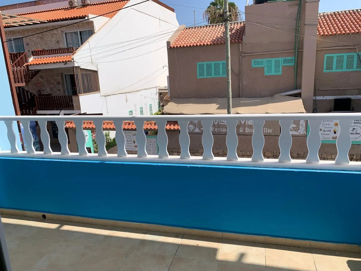 Cozy apartment near beach (pontao) & center — Balcony
