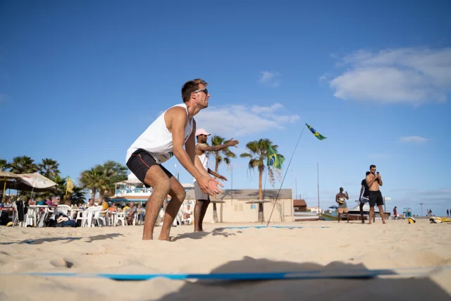 Player digging a ball during a Cabo Libre beach volleyball session in Santa Maria