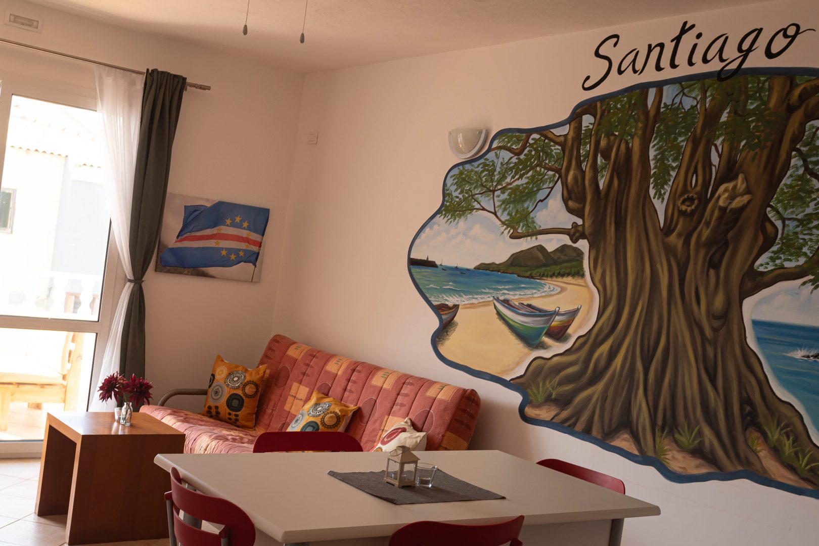 Santiago — living room with Santiago mural