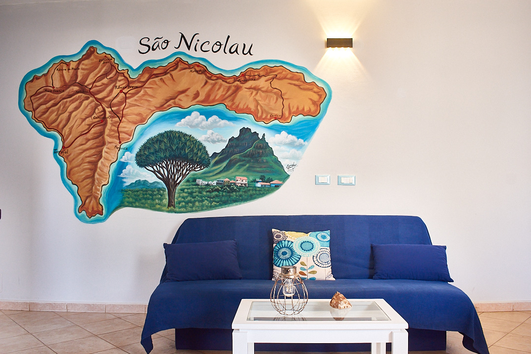 São Nicolau — lounge with hand-painted São Nicolau mural