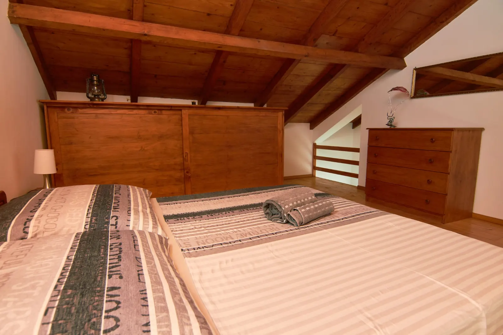 Fogo — mezzanine bedroom under the wooden roof