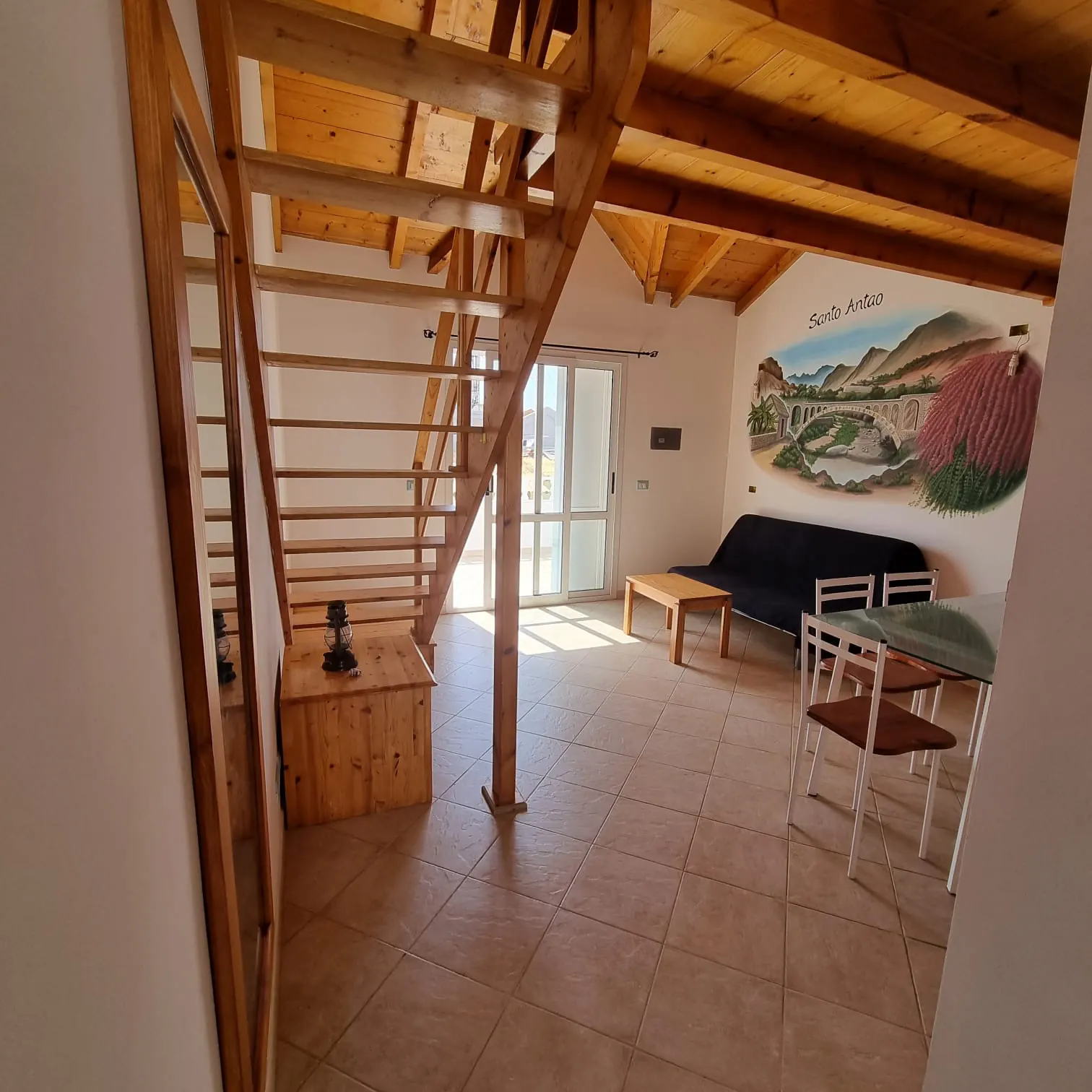 Santo Antão — living space with mezzanine stair